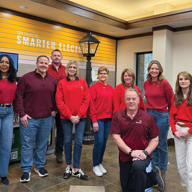 group of people wearing red shirts