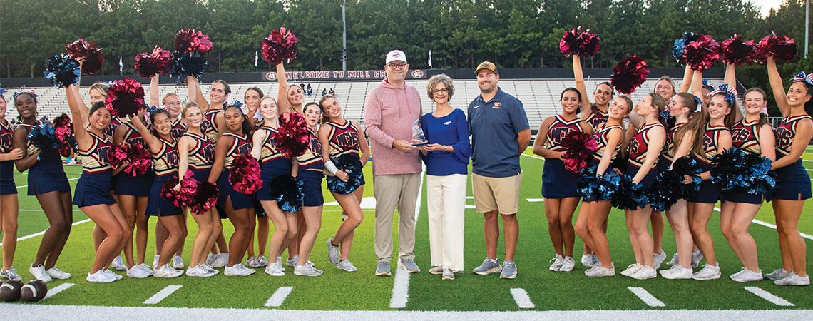 Jackson EMC representatives present the Cooperative Spirit Award