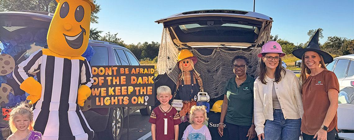 trunk or treat scene with willy wirehand and kids