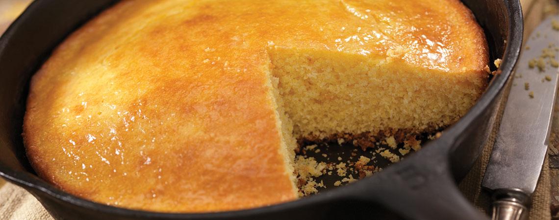 close up of cornbread in skillet