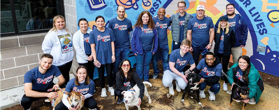 braves players at a dog adoption event