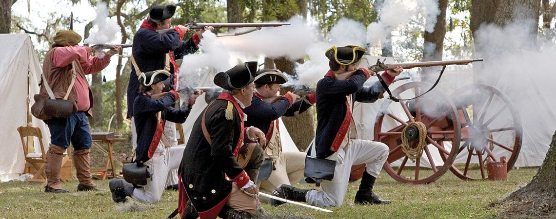 re-enactors of a revolutionary war scene
